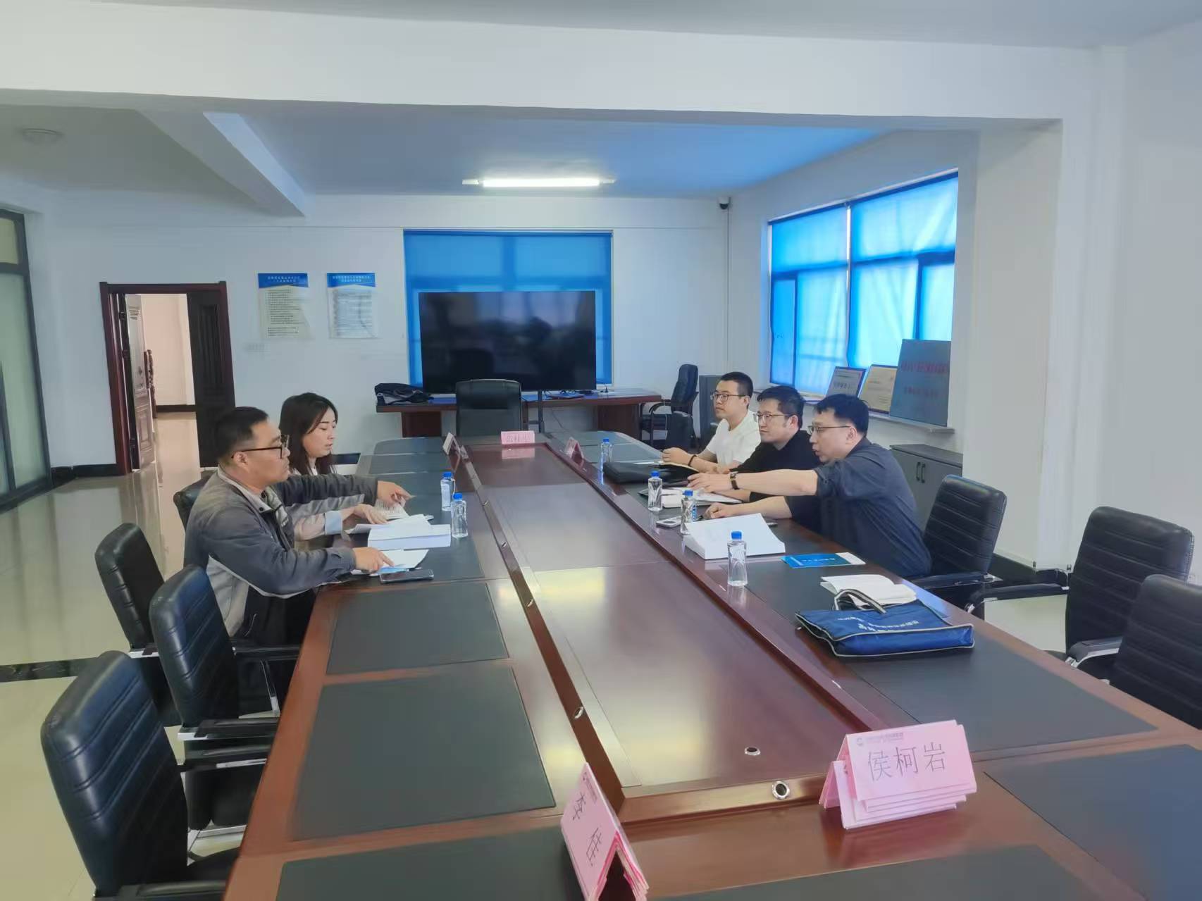 市工信局到九丰液压有限公司解读政策.jpg
